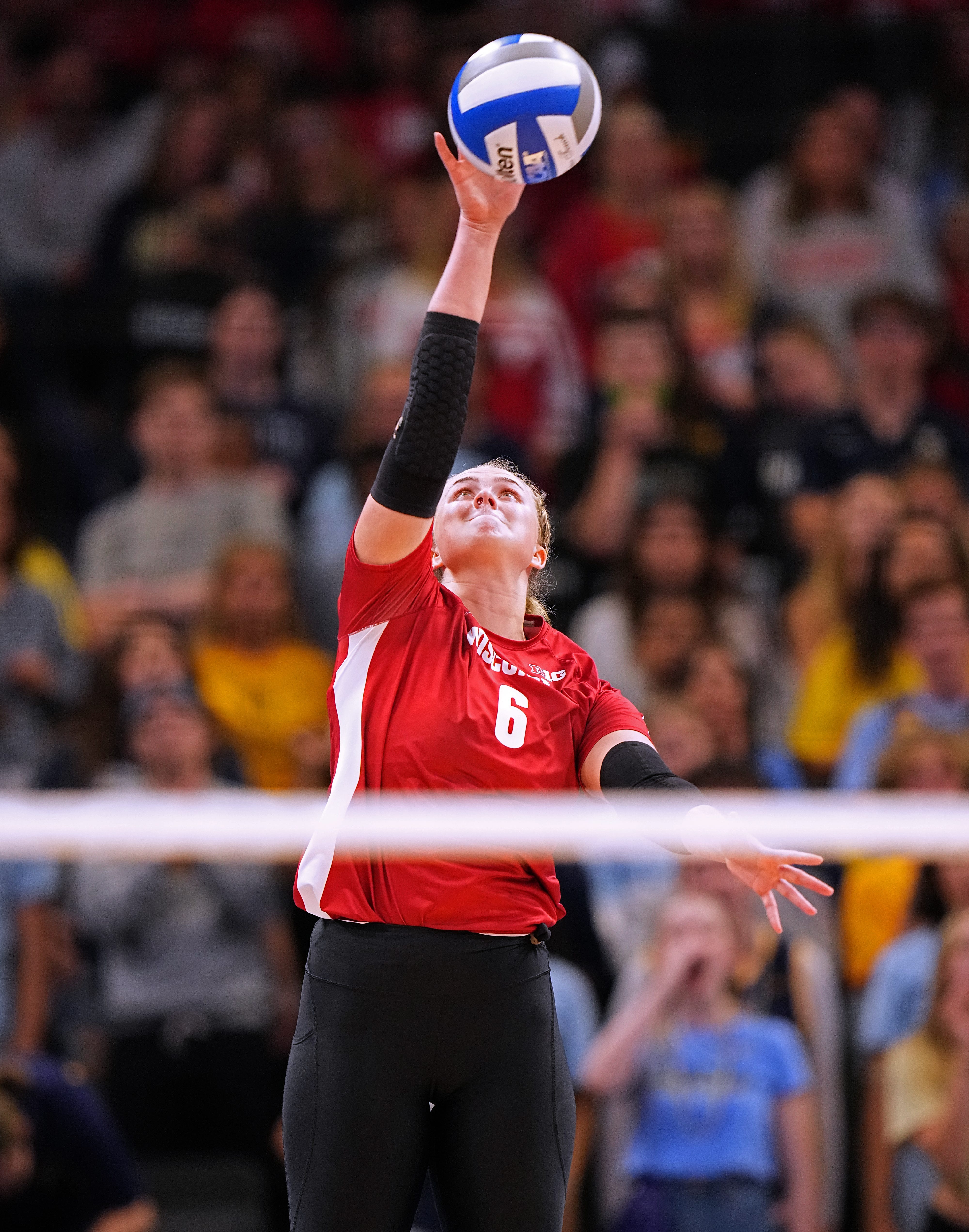 Wisconsin setter MJ Hammill (6) serves during their volleyball match against Marquette Wednesday, September 13, 2023 at Fiserv Forum in Milwaukee, Wis. Official attendance was 17,037 making it the largest indoor regular-season crowd for a volleyball match in NCAA history and the largest crowd to see a women s sporting event in Wisconsin history.