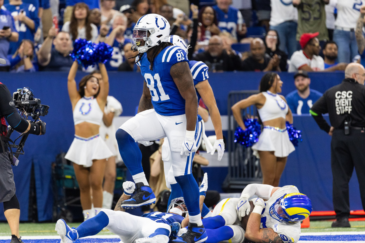 Oct 1, 2023; Indianapolis, Indiana, USA; Indianapolis Colts tight end Mo Alie-Cox (81) celebrates his touchdown in the second half against the Los Angeles Rams at Lucas Oil Stadium. Mandatory Credit: Trevor Ruszkowski-USA TODAY Sports