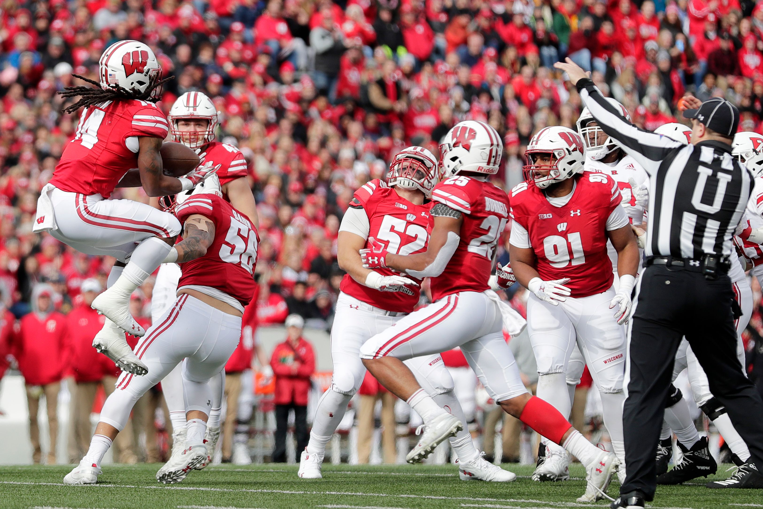 Wisconsin Badgers safety D'Cota Dixon (14) recovers a blocked punt against the Rutgers Scarlet Knights in the second quarterof a Big Ten football game at Camp Randall Stadium on Saturday, November 3, 2018 in Madison, Wis. Adam Wesley/USA TODAY NETWORK-Wisconsin Gpg Badgersvsrutgers 110318 Abw085