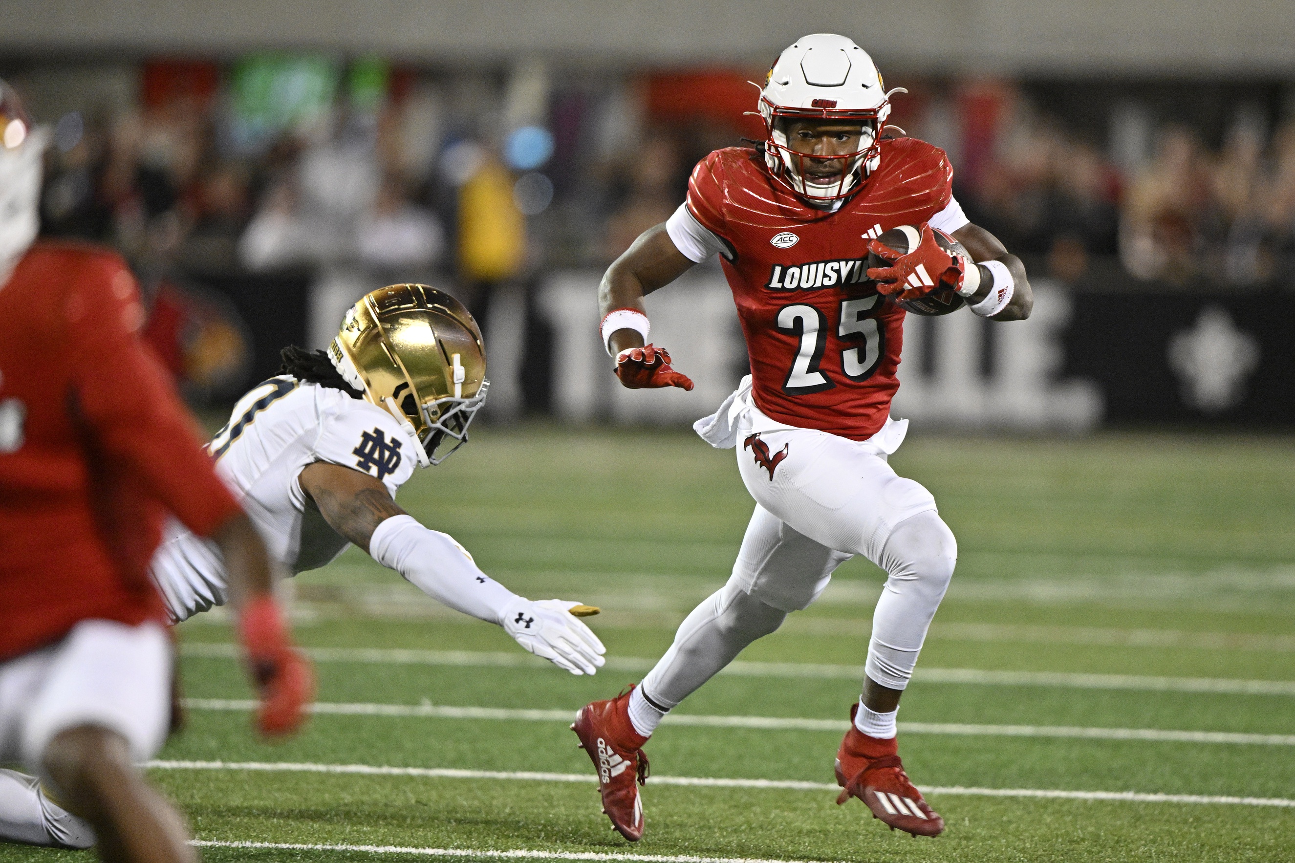 Louisville Football Upsets Notre Dame in Front of Record Crowd to Remain  Unbeaten - Sports Illustrated Louisville Cardinals News, Analysis and More