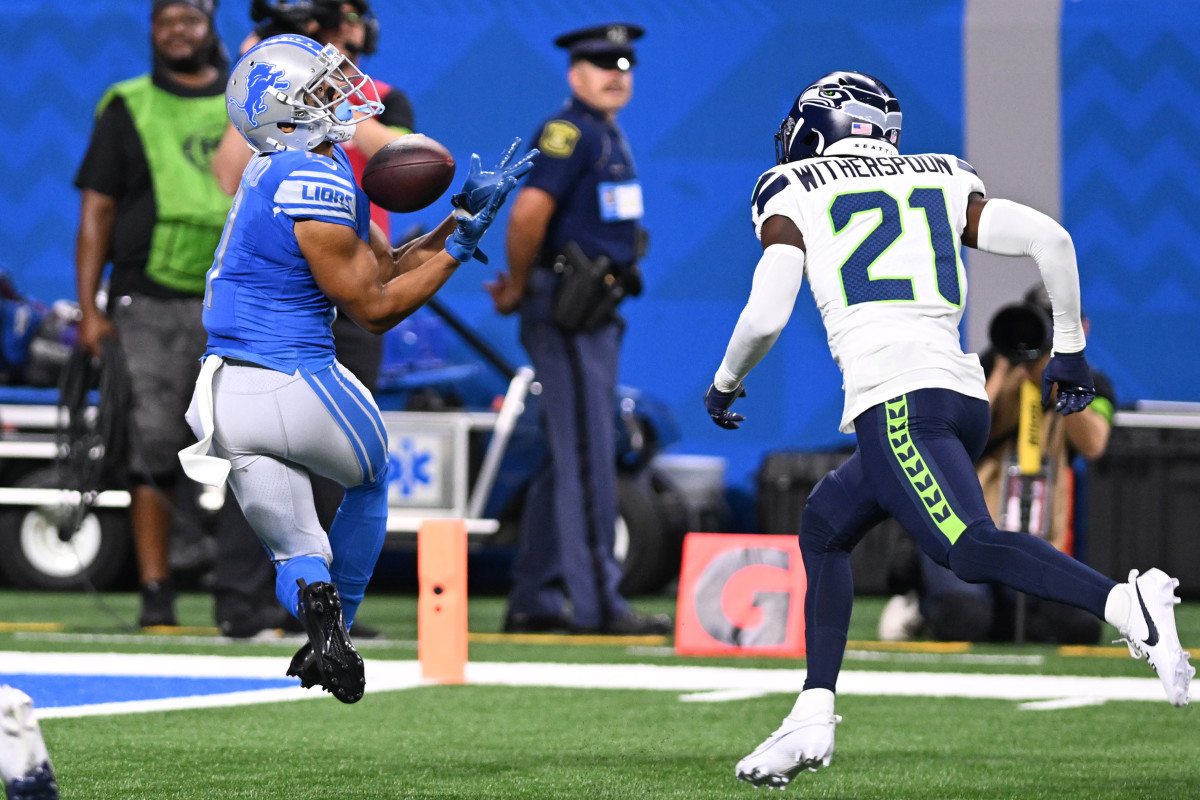 Detroit Lions wide receiver Kalif Raymond (11) catches a touchdown pass against the Seattle Seahawks in the second quarter at Ford Field.