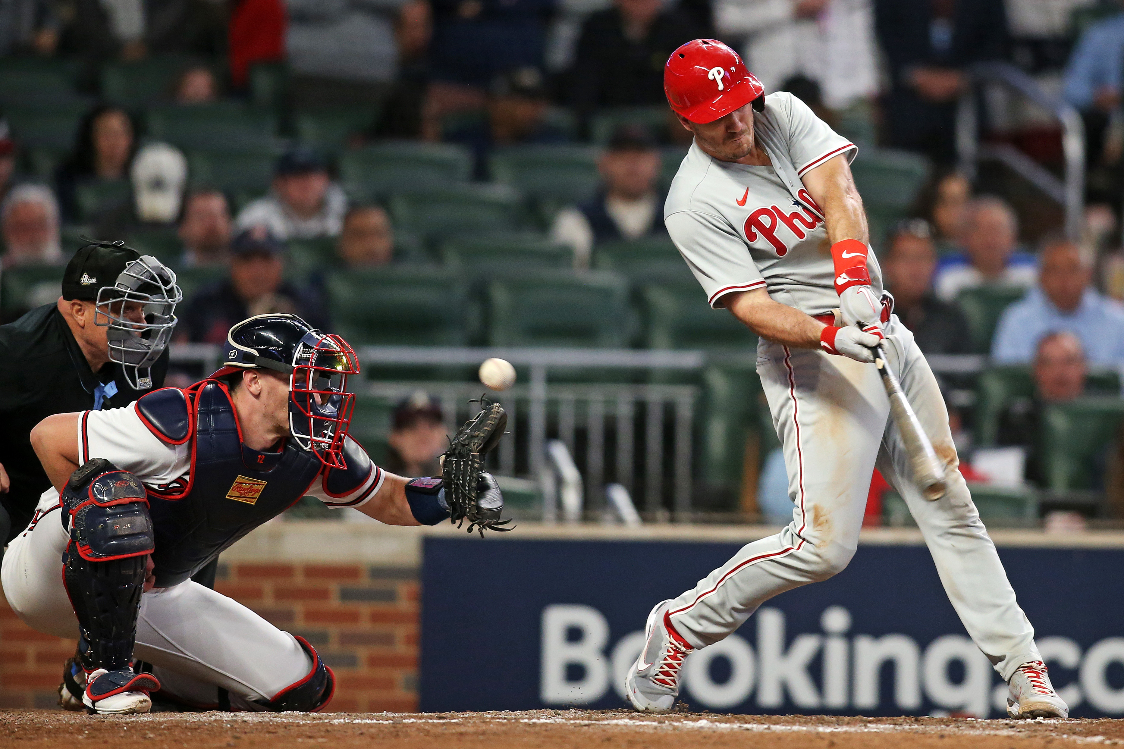 Braves fans throw cans on field after catcher interference call