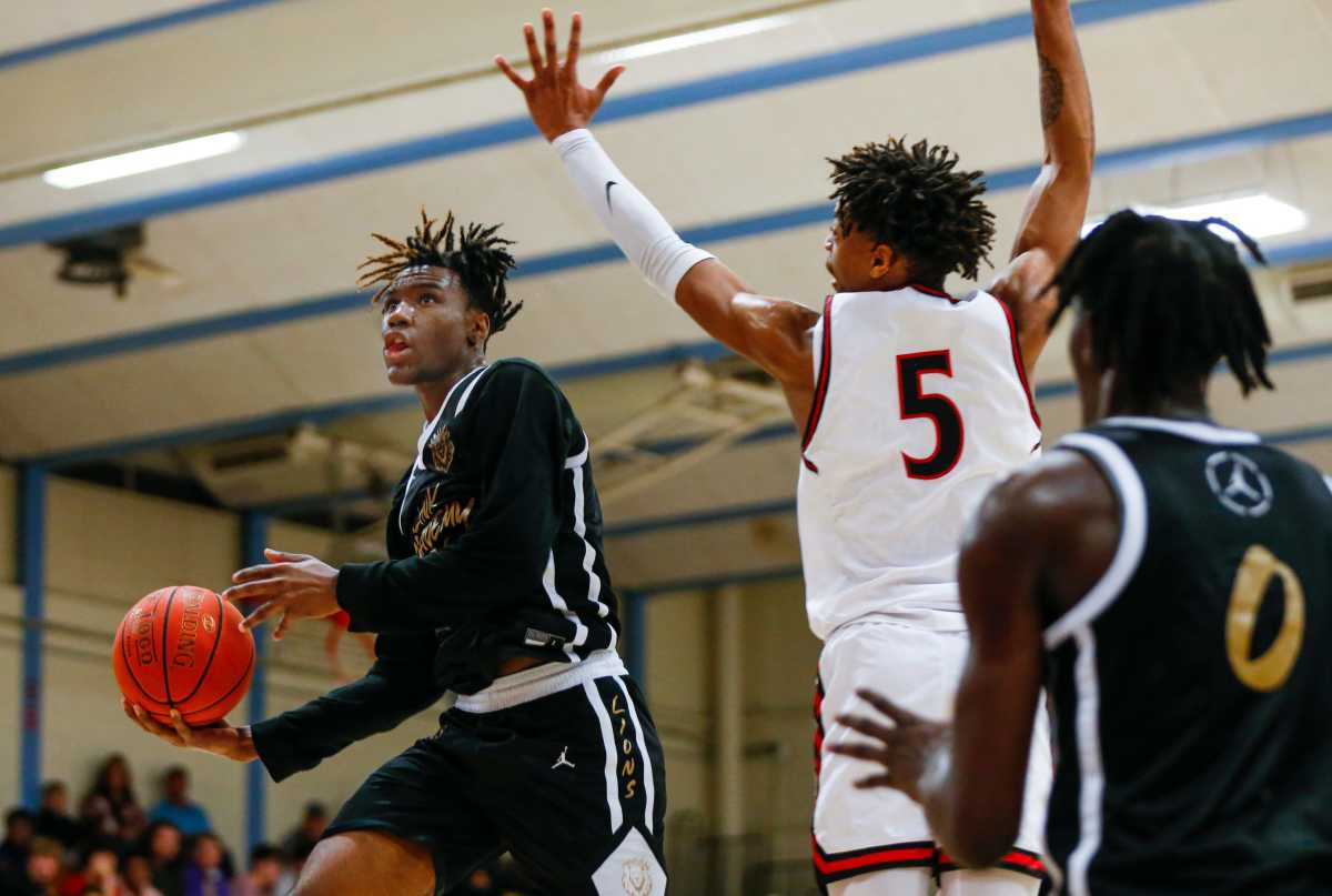 Ja'Kobe Walter of Link Academy goes to the basket during a game against the Legacy (Texas) Broncos in the Ozark Mountain Shootout at Glendale High School on Thursday, Dec. 8, 2022.