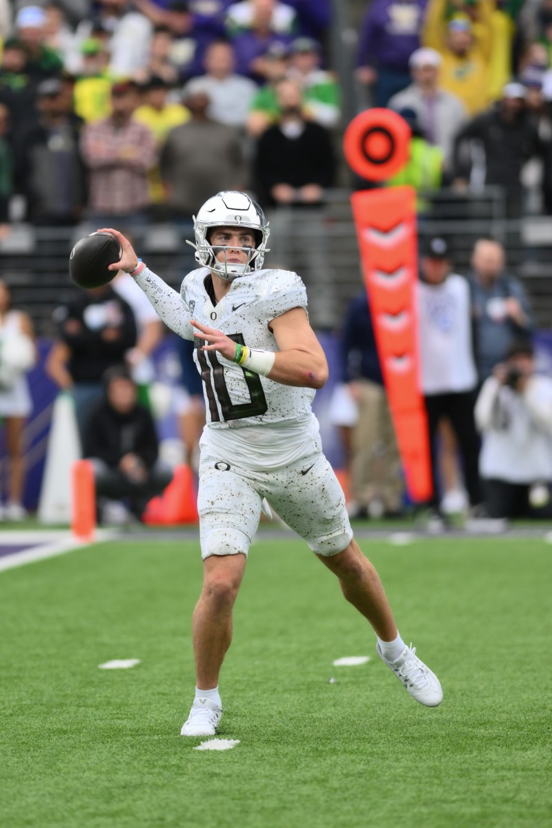 Oregon QB Bo Nix (10) attempting a pass against the University of Washington, 10/14/23