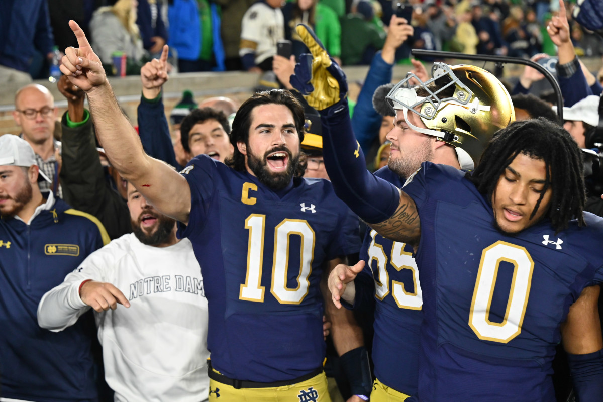 Oct 14, 2023; South Bend, Indiana, USA; Notre Dame Fighting Irish quarterback Sam Hartman (10) celebrates after Notre Dame defeated the USC Trojans at Notre Dame Stadium. Mandatory Credit: Matt Cashore-USA TODAY Sports