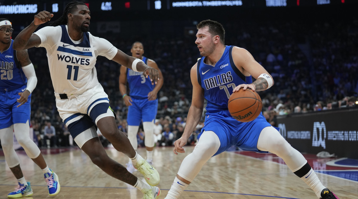 Dallas Mavericks’ Luka Doncic drives during a preseason NBA basketball game against the Minnesota Timberwolves.