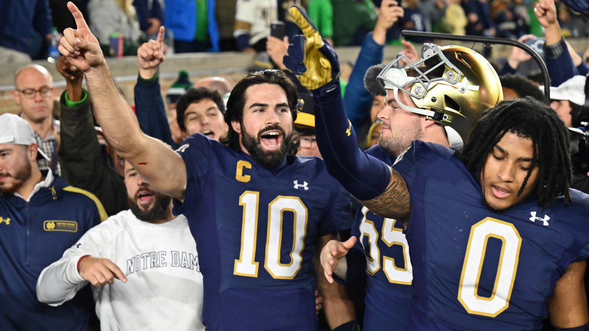 Notre Dame Fighting Irish quarterback Sam Hartman celebrates after Notre Dame defeated the USC Trojans.