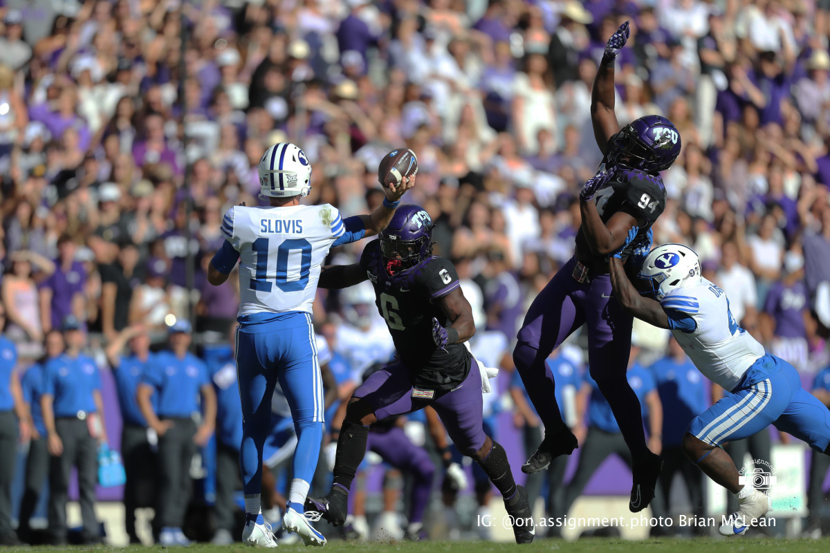 TCU's defense blocks a pass by BYU's Kedon Slovis