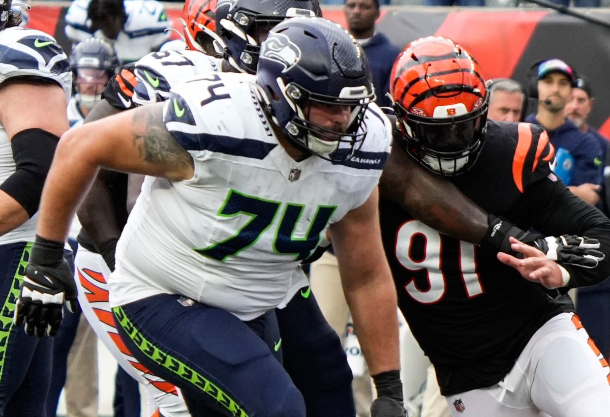 Seattle Seahawks tackle Jake Curhan looks on as the Cincinnati Bengals make a tackle in the backfield at Paycor Stadium on Sunday October 15, 2023