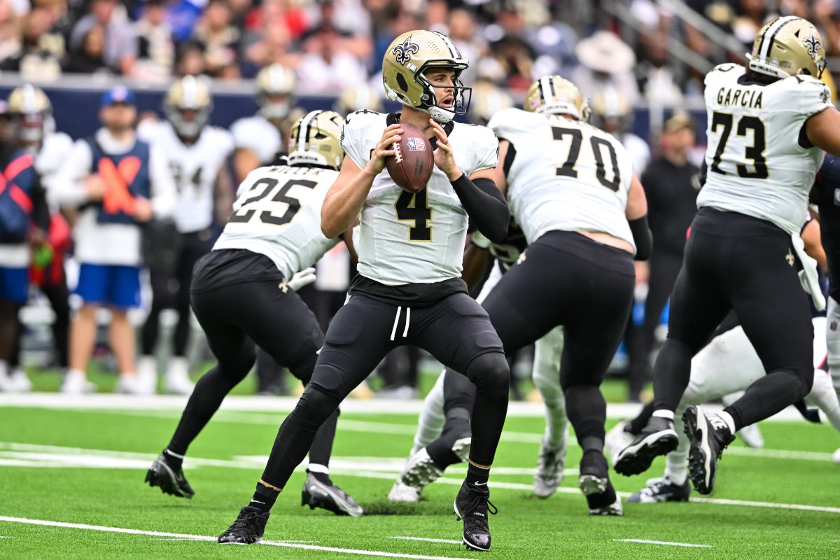 New Orleans Saints quarterback Derek Carr (4) looks to pass the ball