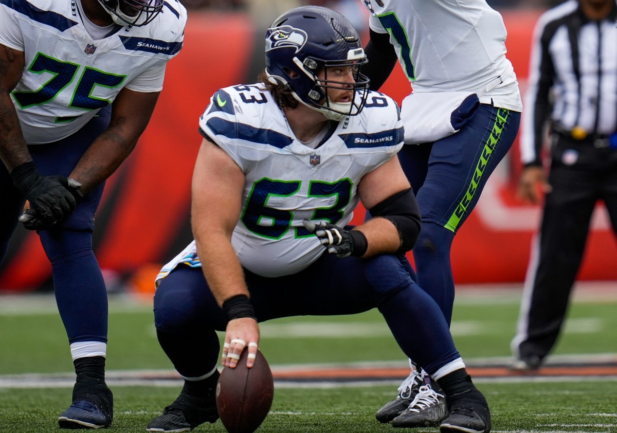 Seattle Seahawks center Evan Brown (63) calls out the defense a the line of scrimmage in the third quarter of the NFL Week 6 game between the Cincinnati Bengals and the Seattle Seahawks at Paycor Stadium in downtown Cincinnati on Sunday, Oct. 15, 2023.