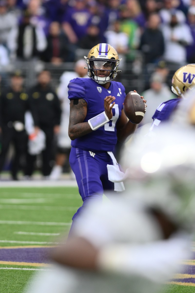 Michael Penix Jr. looks for a receiver against Oregon.