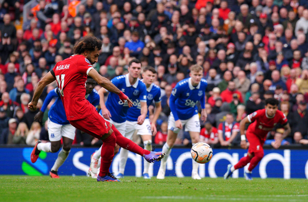 Mo Salah pictured converting a penalty kick for Liverpool against Everton in a Premier League game at Anfield in October 2023