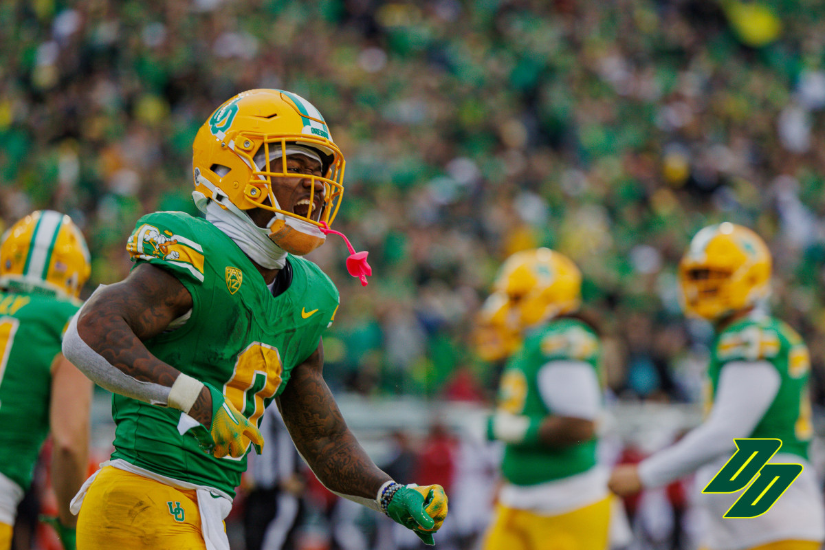 Oregon Ducks running back Bucky Irving celebrates a touchdown against the Washington State Cougars.