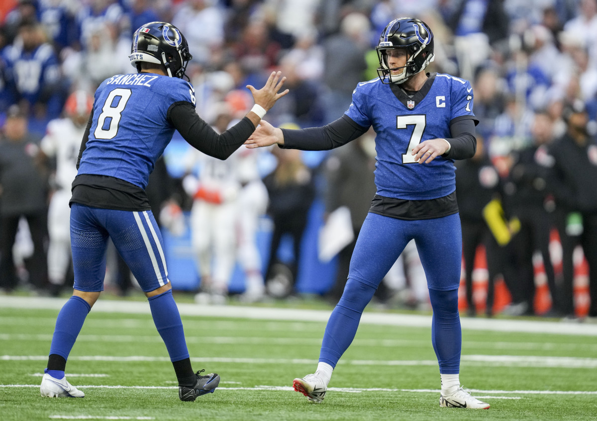 Oct 22, 2023; Indianapolis, Indiana, USA; Indianapolis Colts punter Rigoberto Sanchez (8) gives a high five to Indianapolis Colts place kicker Matt Gay (7) after a successful extra point kick during a game against the Cleveland Browns.