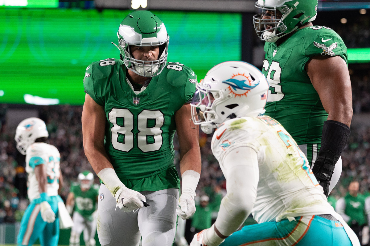 Philadelphia Eagles tight end Dallas Goedert reacts with Miami Dolphins linebacker Bradley Chubb after his touchdown catch and run during the second quarter at Lincoln Financial Field.