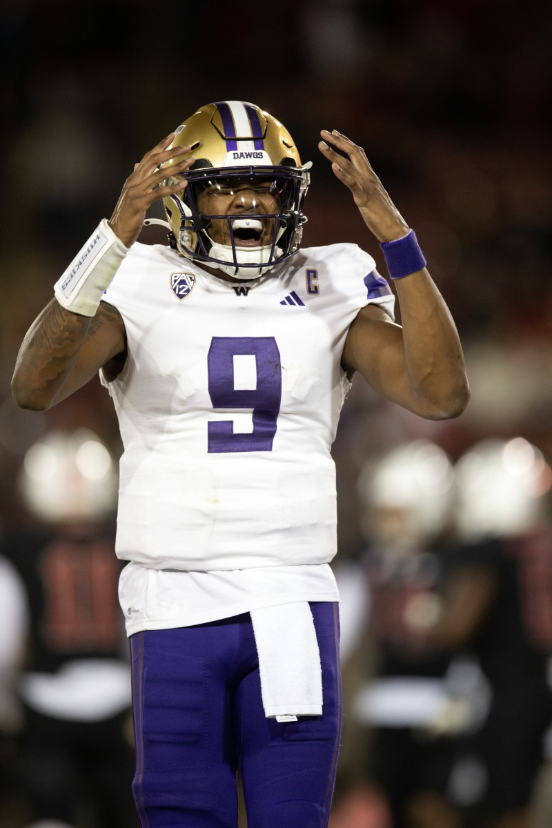 Michael Penix Jr. reacts after throwing one of his 4 touchdown passes against Stanford.