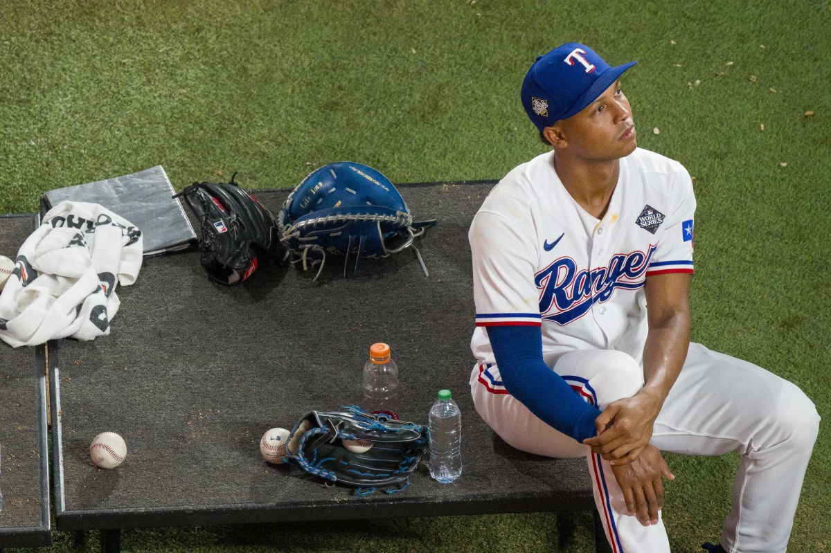 Oct 27, 2023; Arlington, Texas, USA; Texas Rangers relief pitcher Jose Leclerc (25) waits in the bullpen to enter the game against the Arizona Diamondbacks in game one of the 2023 World Series at Globe Life Field.