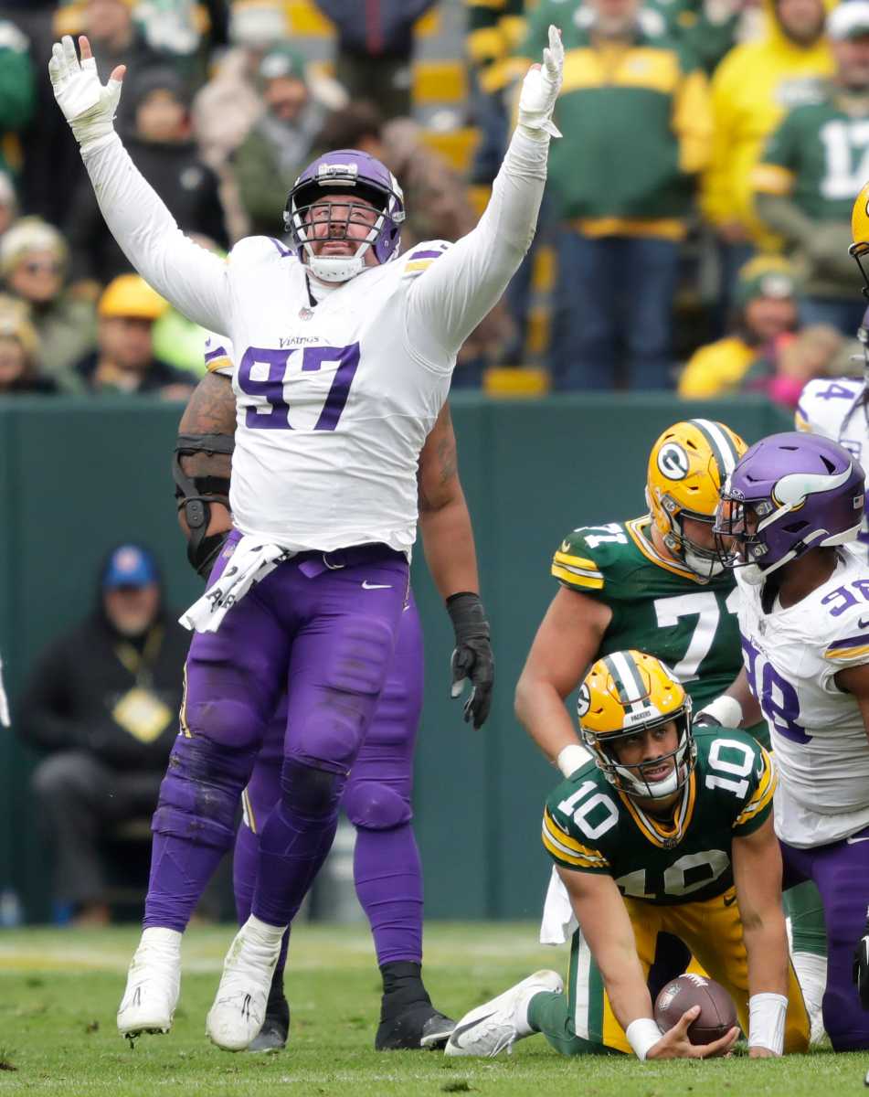 Harrison Phillips reacts after Jordan Love was sacked.