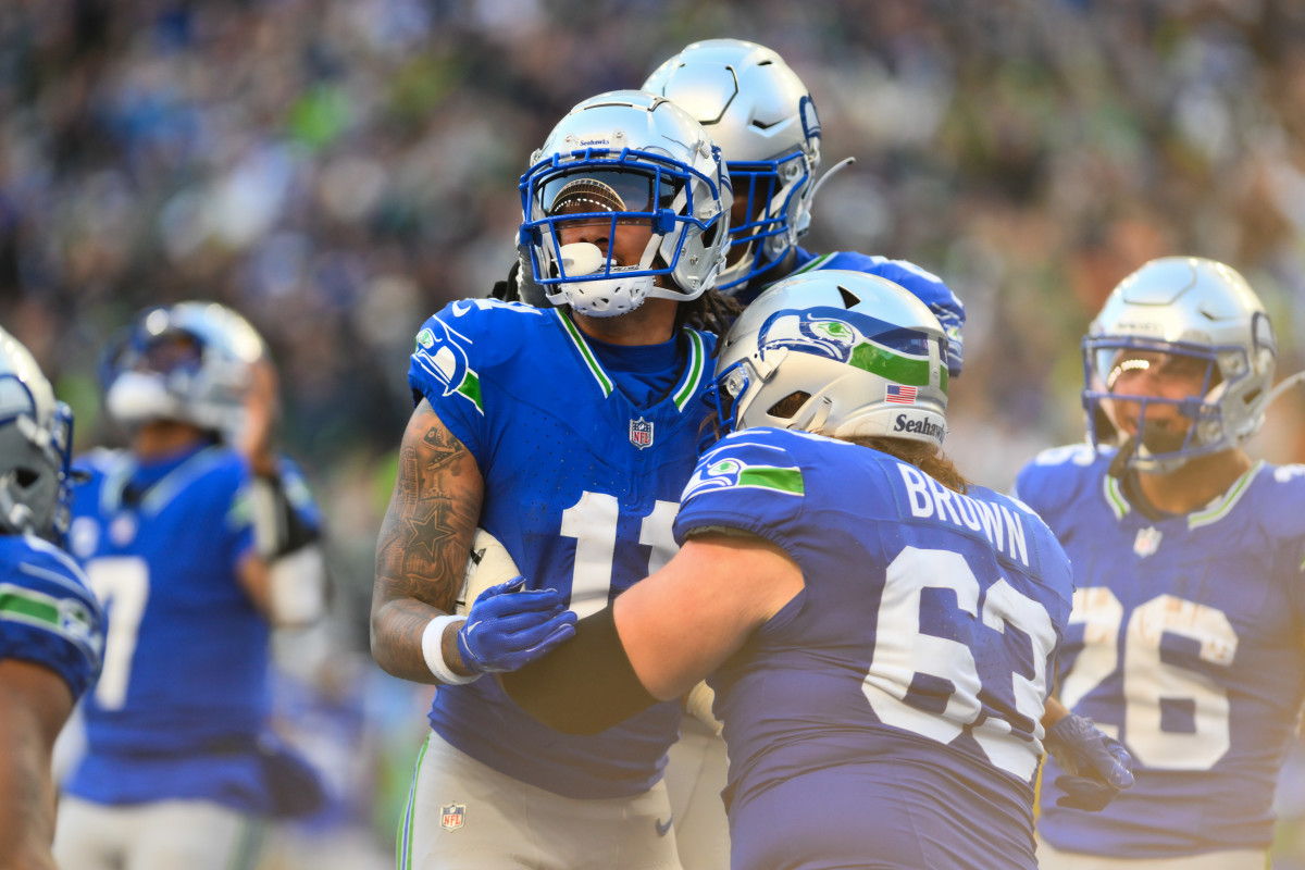 Seattle Seahawks wide receiver Jaxon Smith-Njigba (11) celebrates after scoring a touchdown against the Cleveland Browns during the second half at Lumen Field.