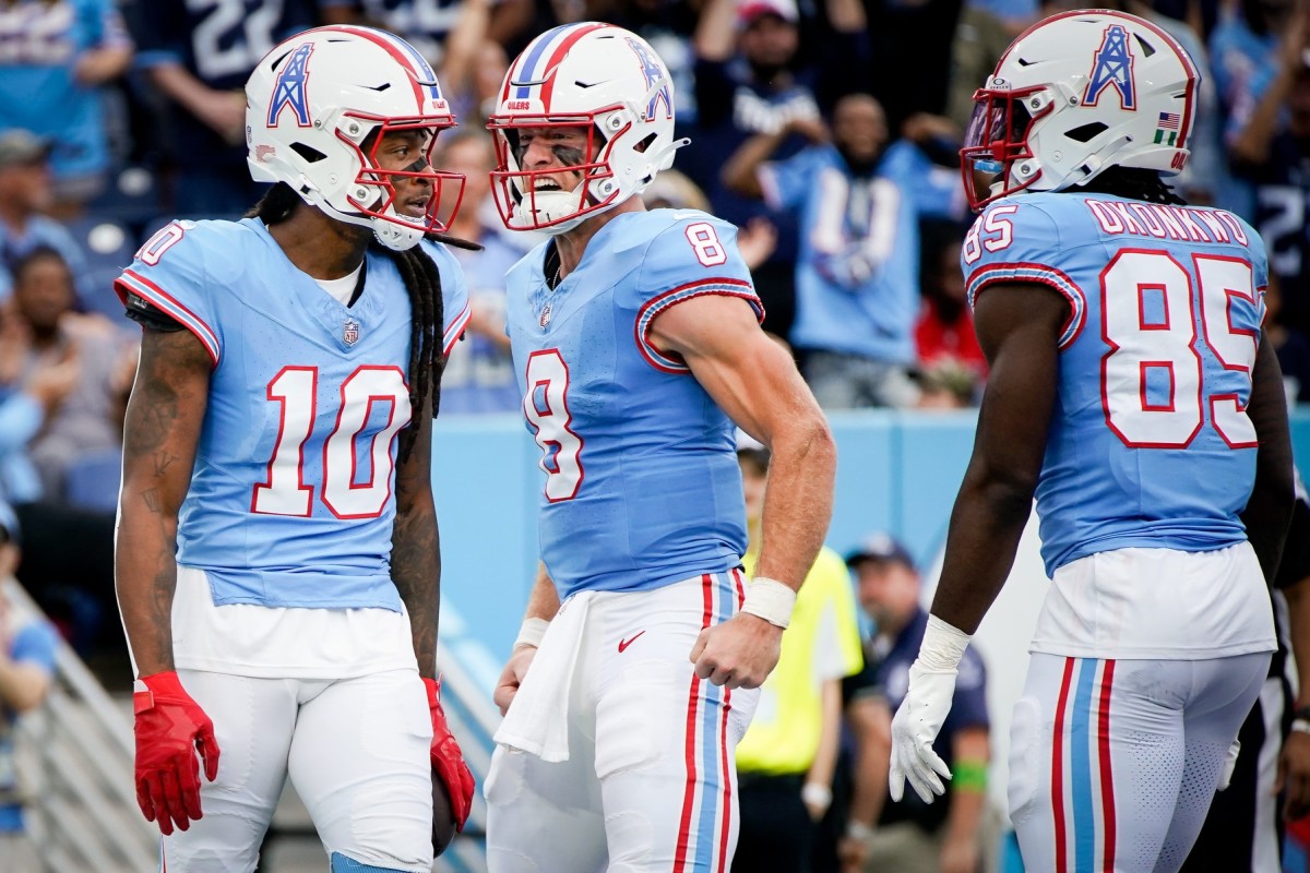 Tennessee Titans quarterback Will Levis (8) reacts after wide receiver DeAndre Hopkins (10) received a pass for a touchdown against the Atlanta Falcons.