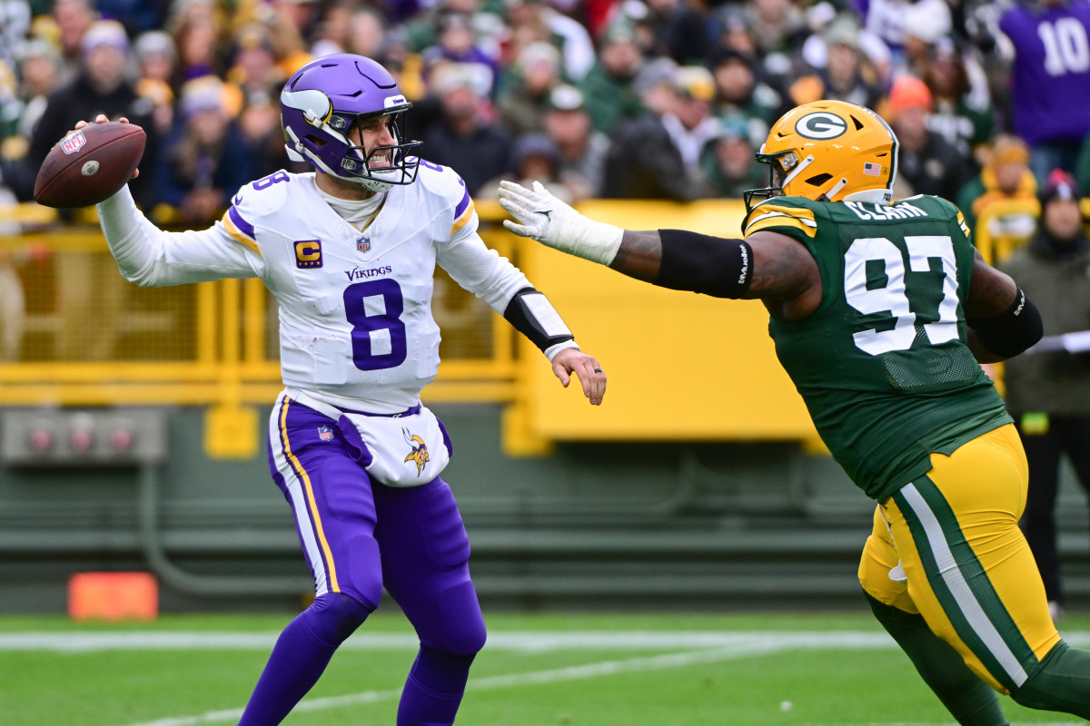 Kenny Clark chases Kirk Cousins in the Packers 24-10 loss