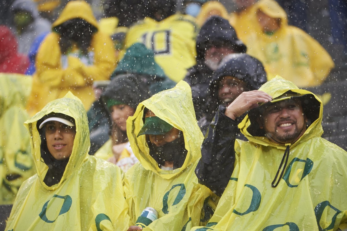 Duck fans are prepared for rainy weather. Photo by Troy Wayrynen, USA TODAY Sports