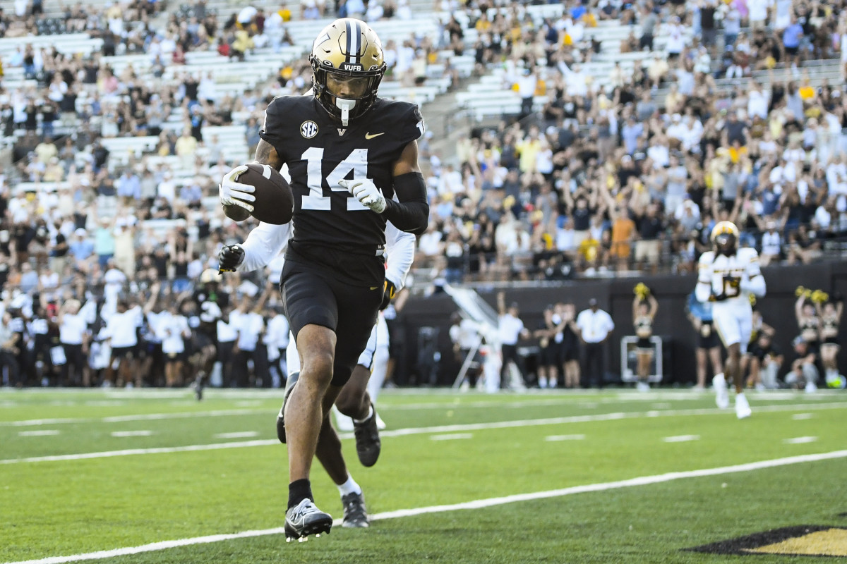 Sep 30, 2023; Nashville, Tennessee, USA; Vanderbilt Commodores wide receiver Will Sheppard (14) scores a touchdown against the Missouri Tigers during the second half at FirstBank Stadium. Mandatory Credit: Steve Roberts-USA TODAY Sports