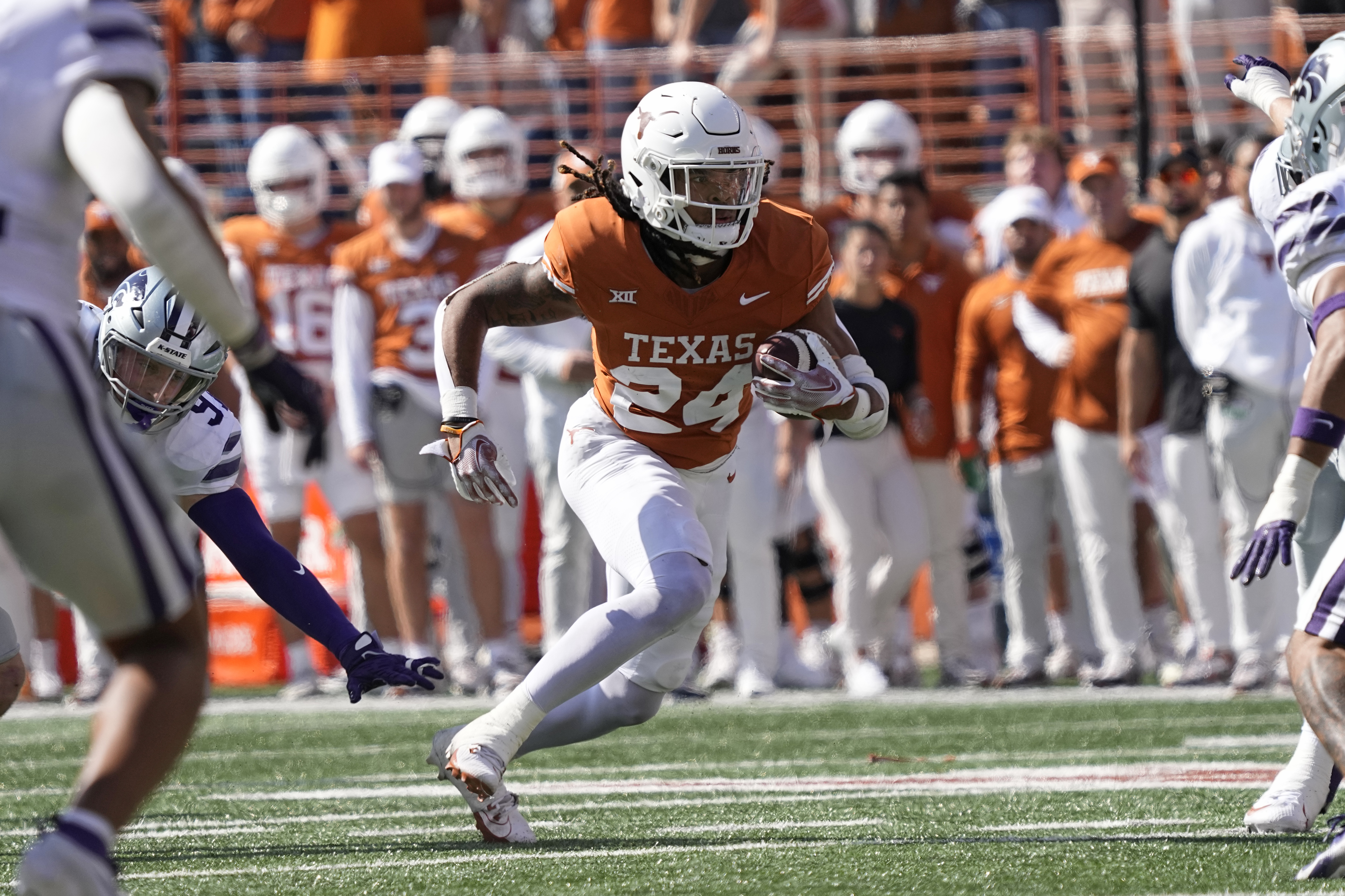 Texas Longhorns running back Jonathon Brooks (24) runs for yard during the first half against the Kansas State Wildcats at Darrell K Royal-Texas Memorial Stadium.