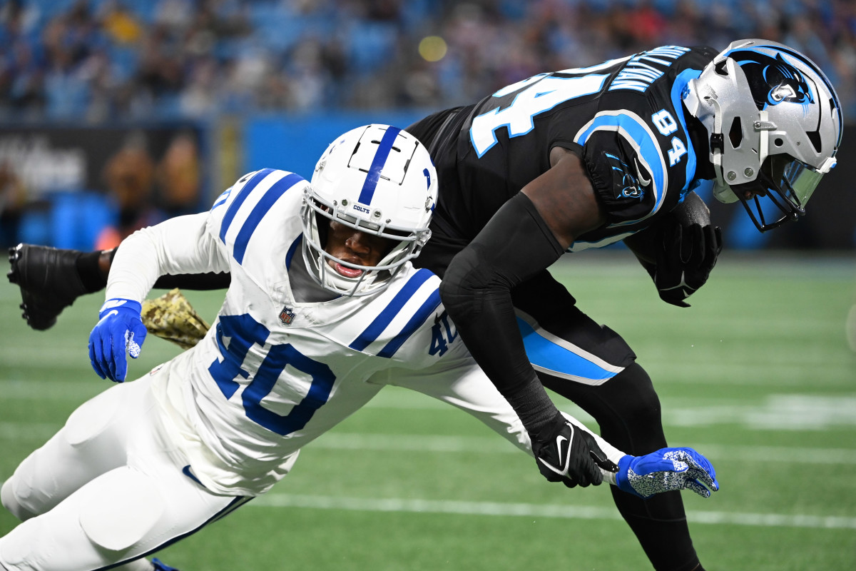 Nov 5, 2023; Charlotte, North Carolina, USA; Carolina Panthers tight end Stephen Sullivan (84) catches the ball as Indianapolis Colts cornerback Jaylon Jones (40) defends in the fourth quarter at Bank of America Stadium. Mandatory Credit: Bob Donnan-USA TODAY Sports