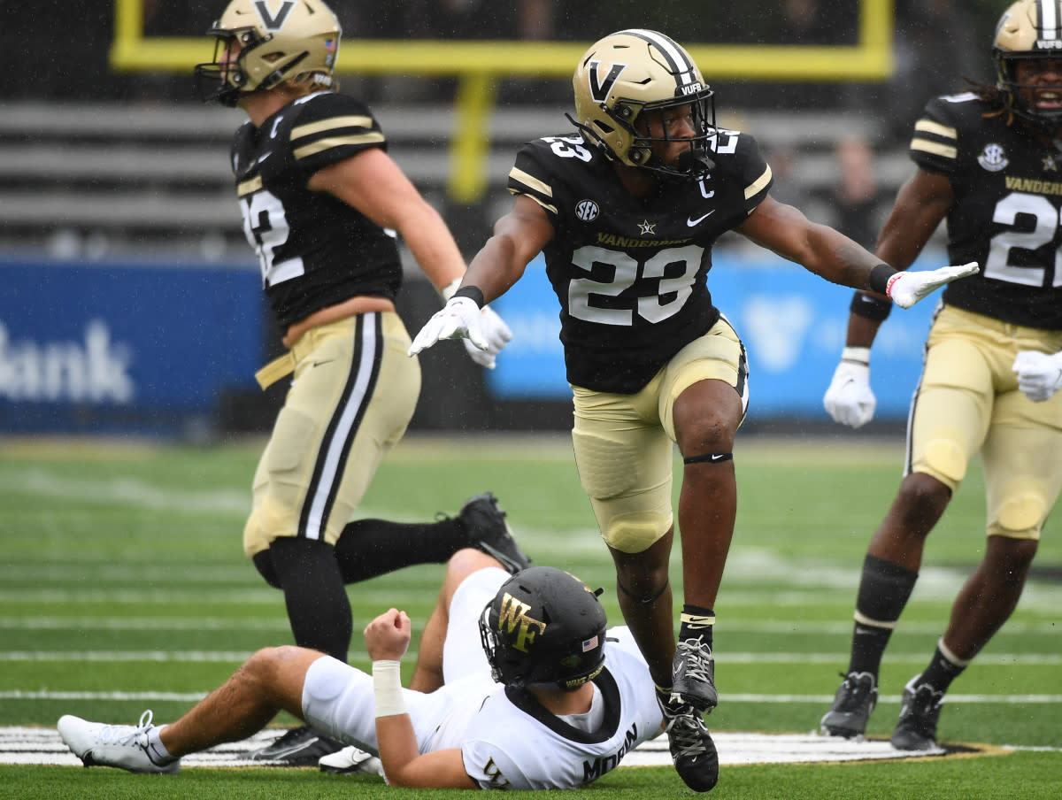 Jaylen Mahoney celebrating a pressure on Wake Forest's quarterback, resulting in an incomplete pass