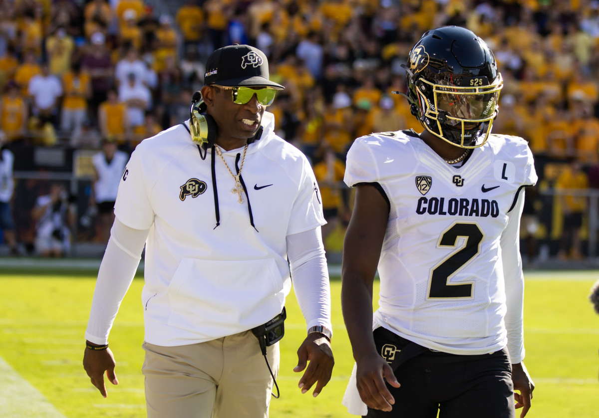 Colorado coach Deion Sanders and quarterback Deion Sanders during the Buffaloes' 27-24 win over Arizona State on Oct. 7, 2023.