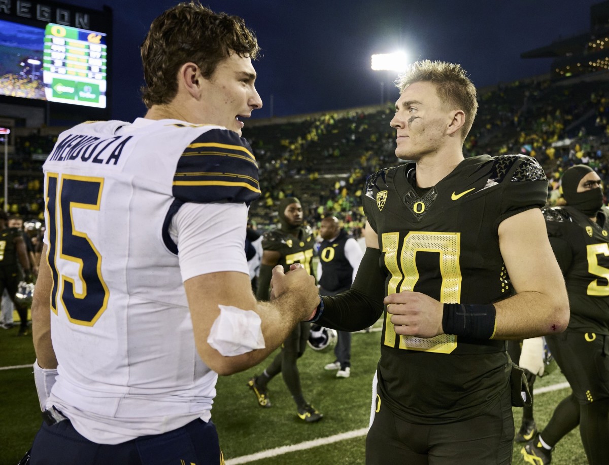 Fernando Mendoza meet with Oregon QV Bo Nix post-game