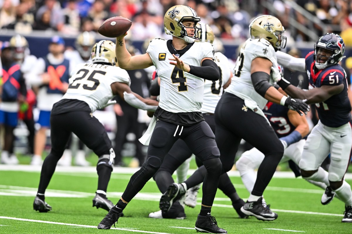 New Orleans Saints quarterback Derek Carr (4) looks to pass the ball against the Houston Texans. Mandatory Credit: Maria Lysaker-USA TODAY Sports