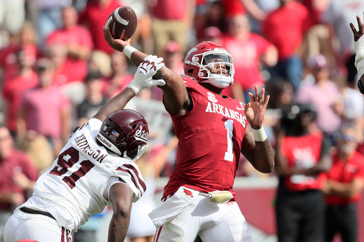 Oct 21, 2023; Fayetteville, Arkansas, USA; Mississippi State Bulldogs defensive end Deonte Anderson (91) hits the arm of Arkansas Razorbacks quarterback KJ Jefferson (1) during the second half by at Donald W. Reynolds Razorback Stadium. Mississippi State won 7-3. Mandatory Credit: Nelson Chenault-USA TODAY Sports