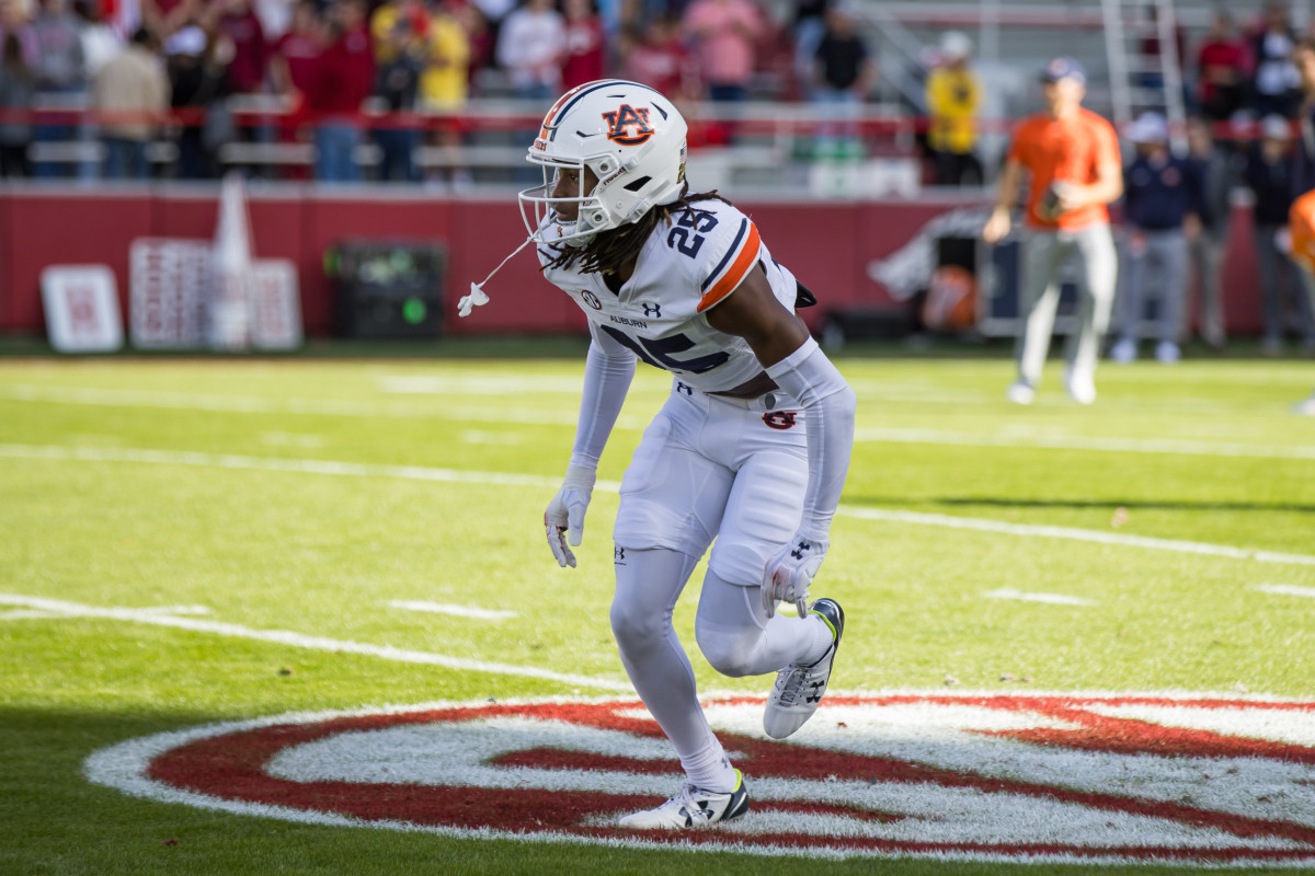 Nov 11, 2023; Fayetteville, Arkansas, USA; Auburn Tigers cornerback Champ Anthony (25) warms up before the game against the Arkansas Razorbacks at Donald W. Reynolds Razorback Stadium. Mandatory Credit: Brett Rojo-USA TODAY Sports 