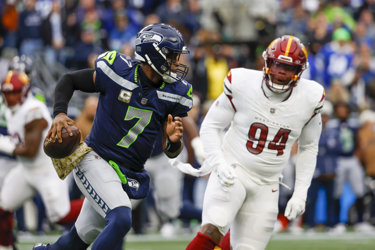 Seattle Seahawks quarterback Geno Smith (7) looks to pass against the Washington Commanders during the first quarter at Lumen Field.