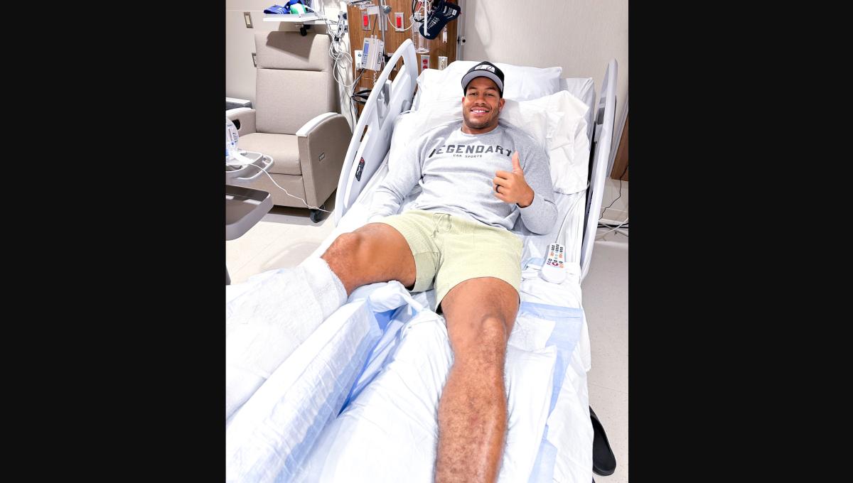 Vikings linebacker Jordan Hicks in a hospital bed following surgery on his right shin. 