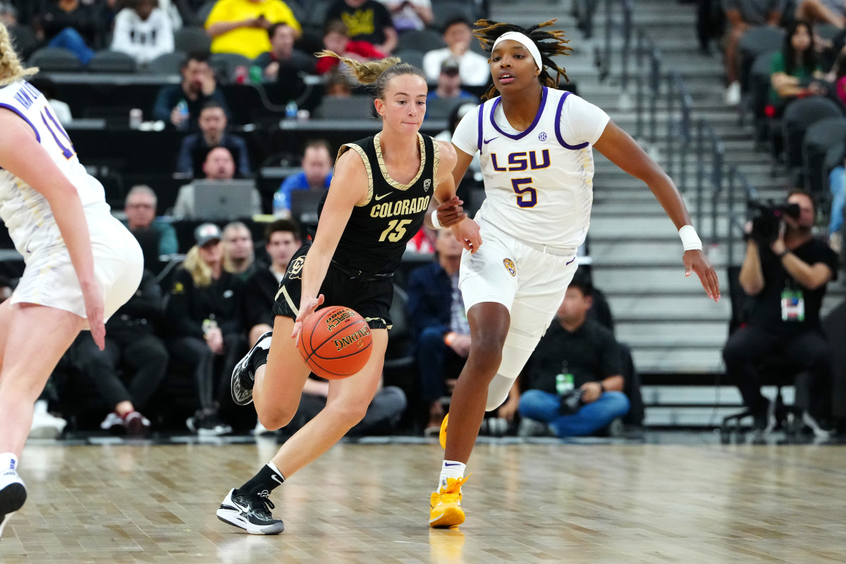 Colorado Buffaloes guard Kindyll Wetta (15) dribbles against LSU Lady Tigers forward Sa'Myah Smith (5) during the fourth quarter at T-Mobile Arena