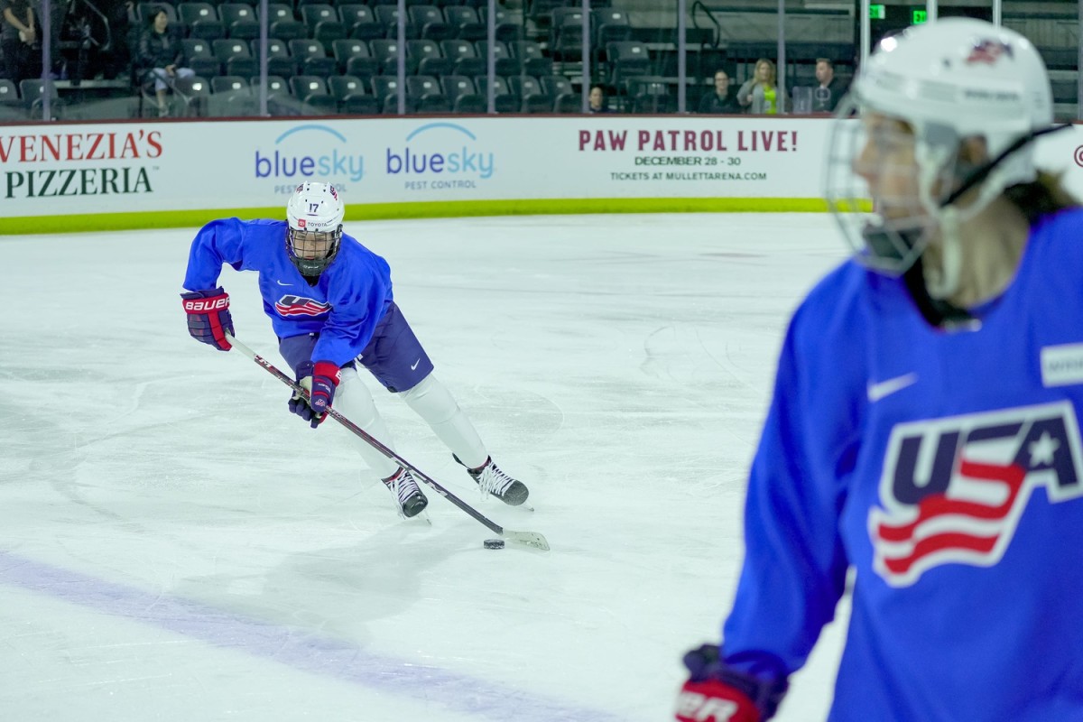 Britta Curl (17) moves the puck as she practices with Team USA at Mullett Arena in Tempe on Nov. 6, 2023.