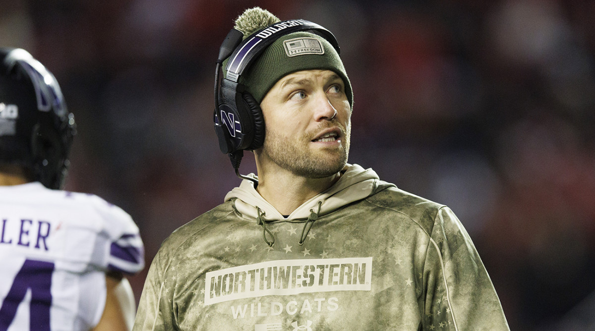 Northwestern interim coach David Braun looks on during the fourth quarter against Wisconsin.