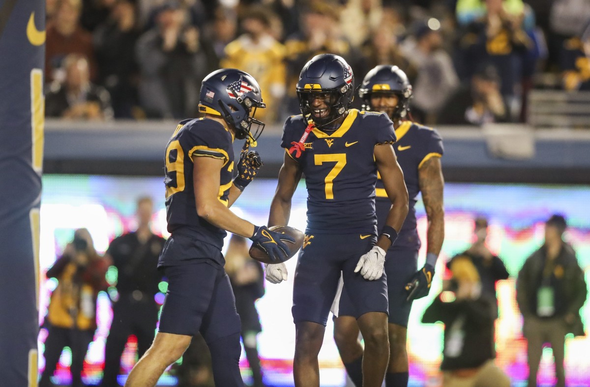 Spread & Over/Under Predictions For WVU Vs. Cincinnati - Sports ...