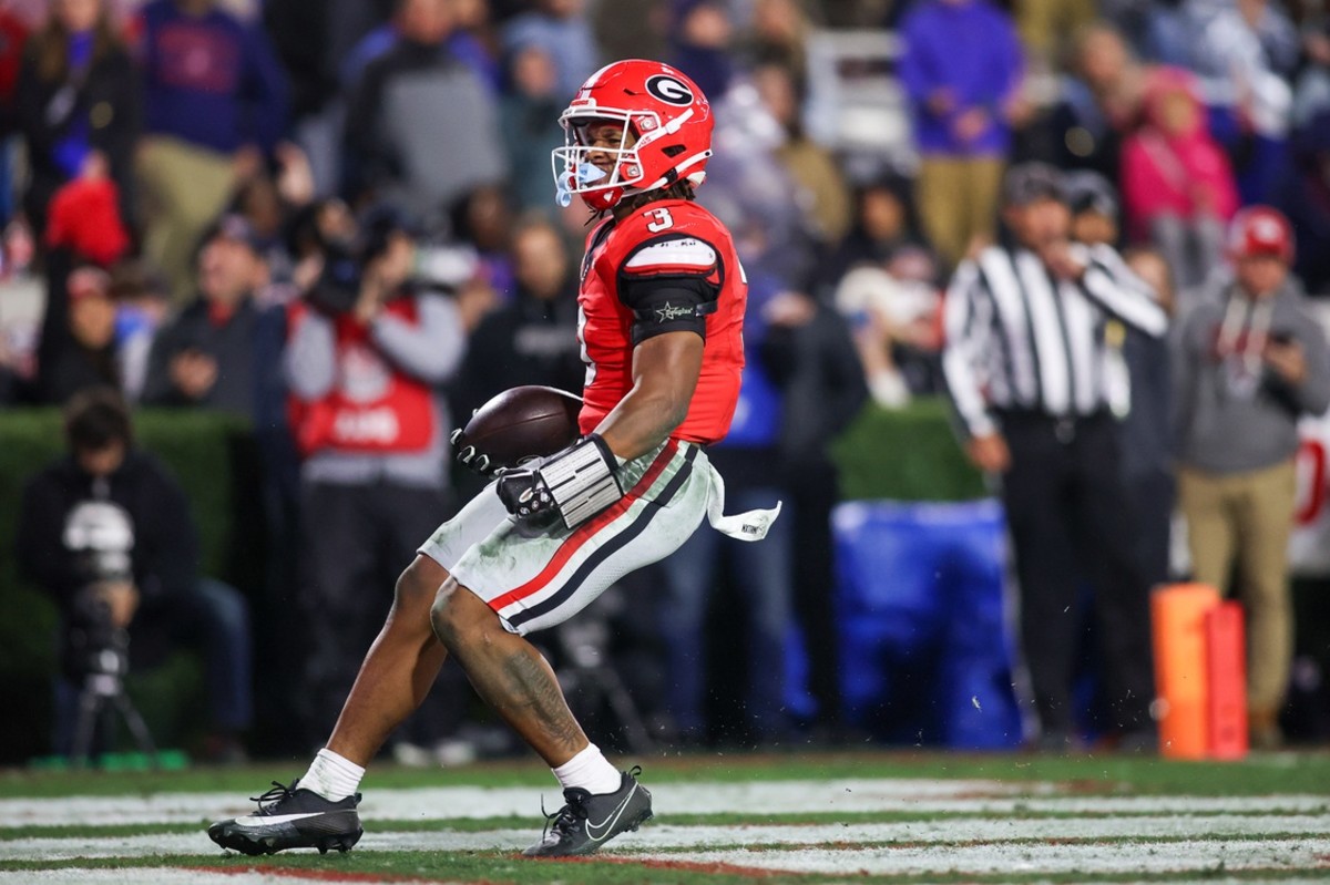 Nov 11, 2023; Athens, Georgia, USA; Georgia Bulldogs running back Andrew Paul (3) runs for a touchdown against the Mississippi Rebels in the fourth quarter at Sanford Stadium.