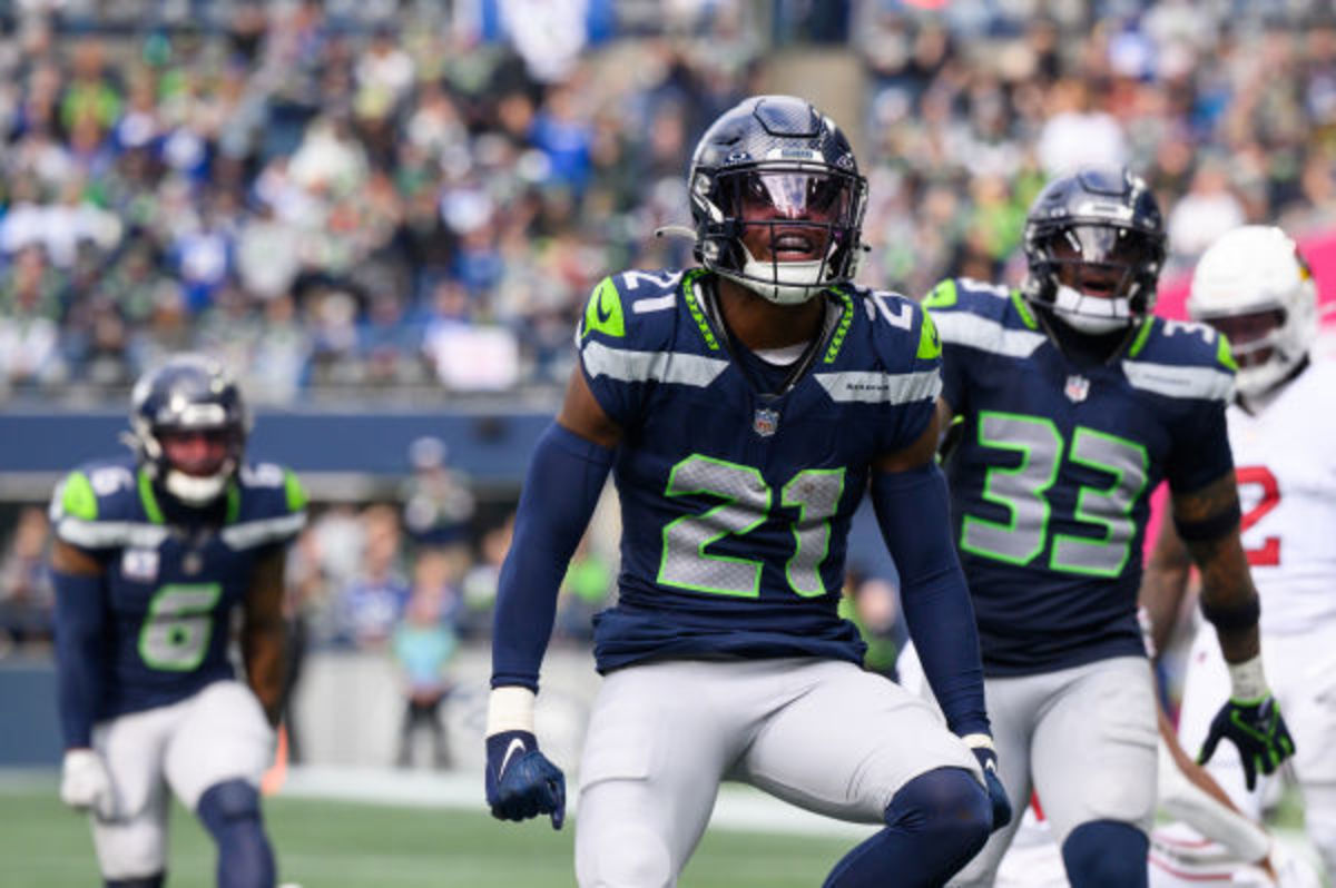 Witherspoon celebrates a big play against the Arizona Cardinals at Lumen Field on Oct. 22.