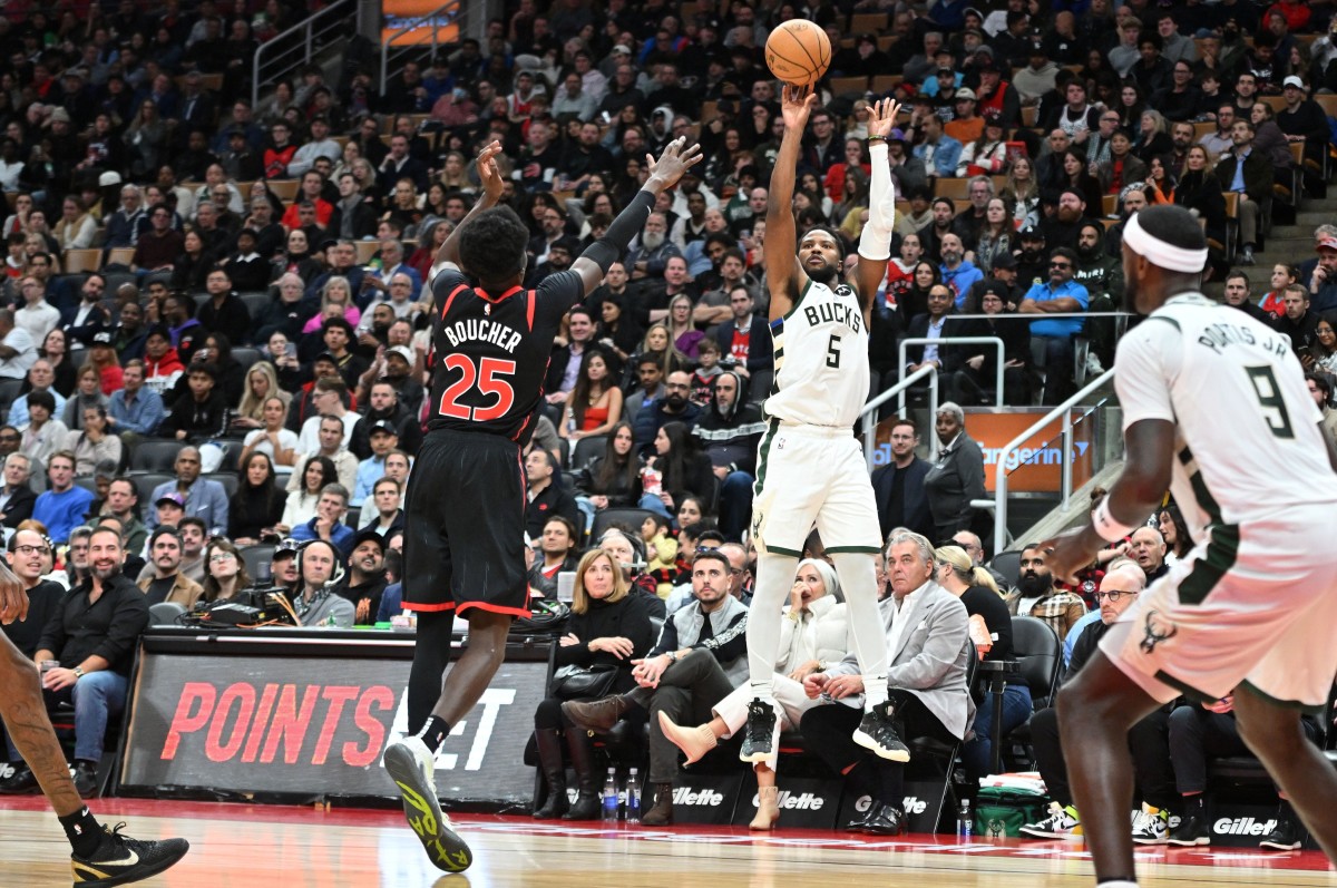 Milwaukee Bucks guard Malik Beasley (5) shoots the ball against the Toronto Raptors