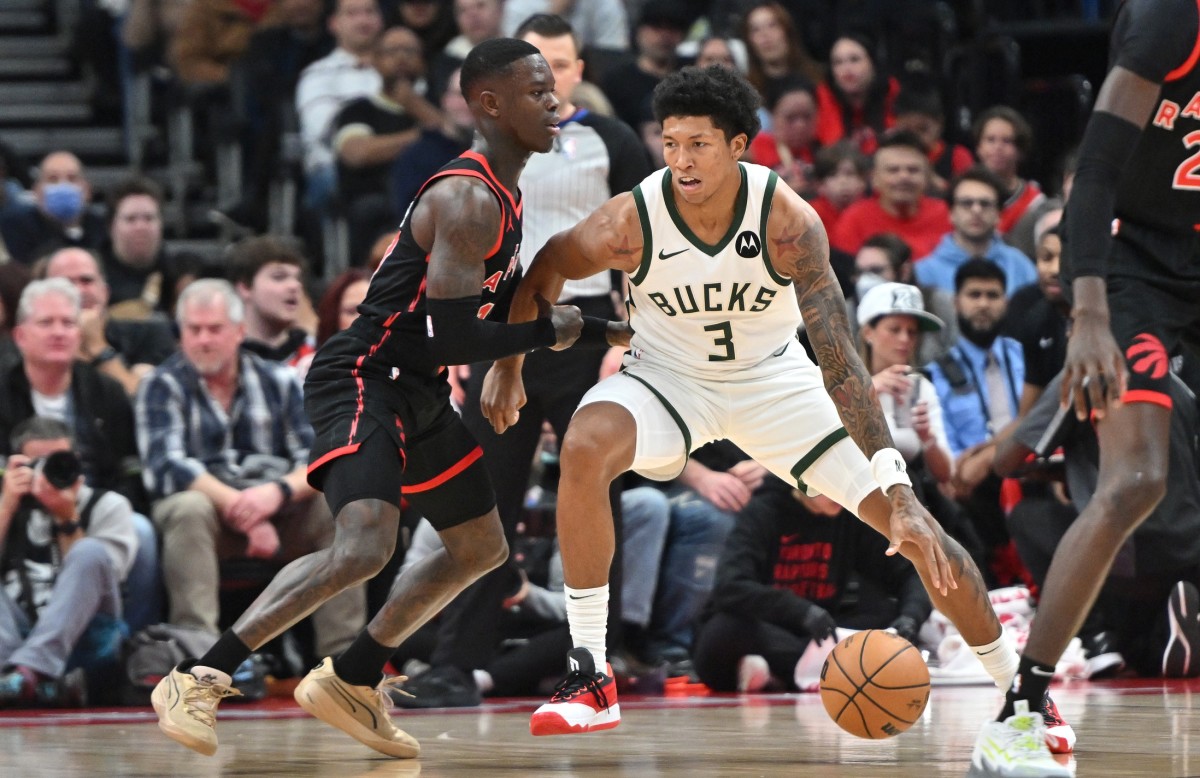 Milwaukee Bucks guard MarJon Beauchamp (3) dribbles the ball as Toronto Raptors guard Dennis Schroder (17)