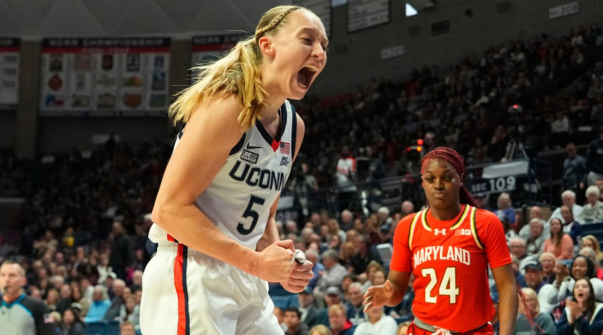 UConn guard Paige Bueckers yells after blocking a shot during a game against Maryland.