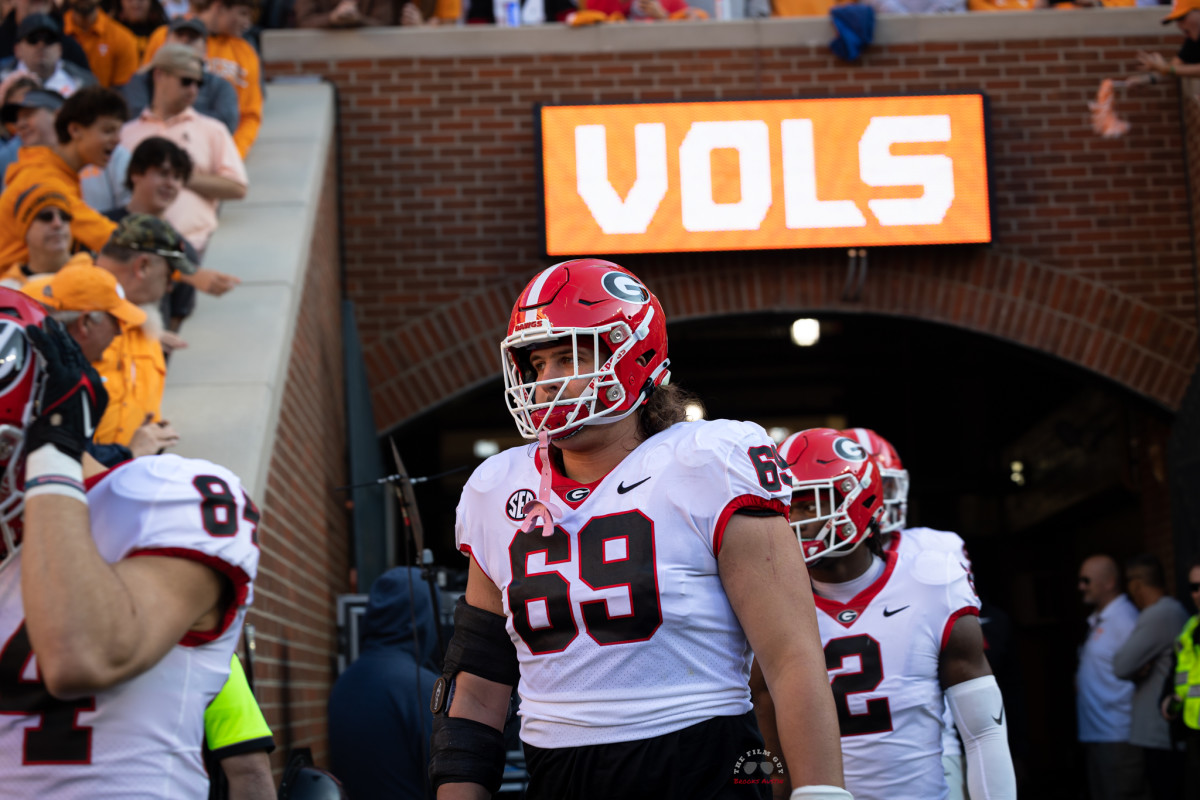 Georgia Bulldogs offensive guard (#69) Tate Ratledge is walking out of the tunnel for their rivalry game against the Tennessee Volunteers. (Brooks Austin / Dawgs Daily).