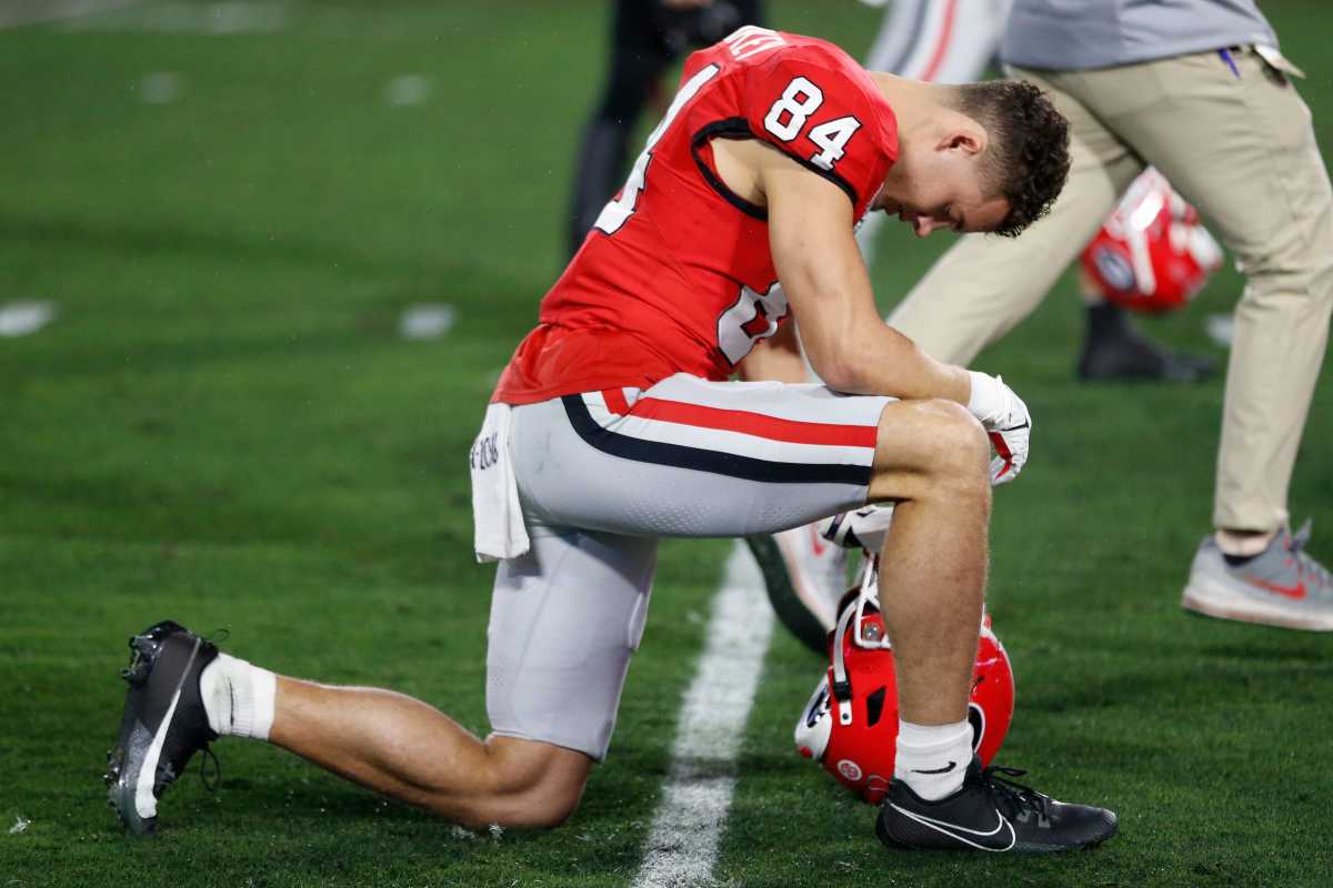 Georgia WR, Ladd McConkey takes a knee prior to the game / Photo VIA - Tony Walsh 