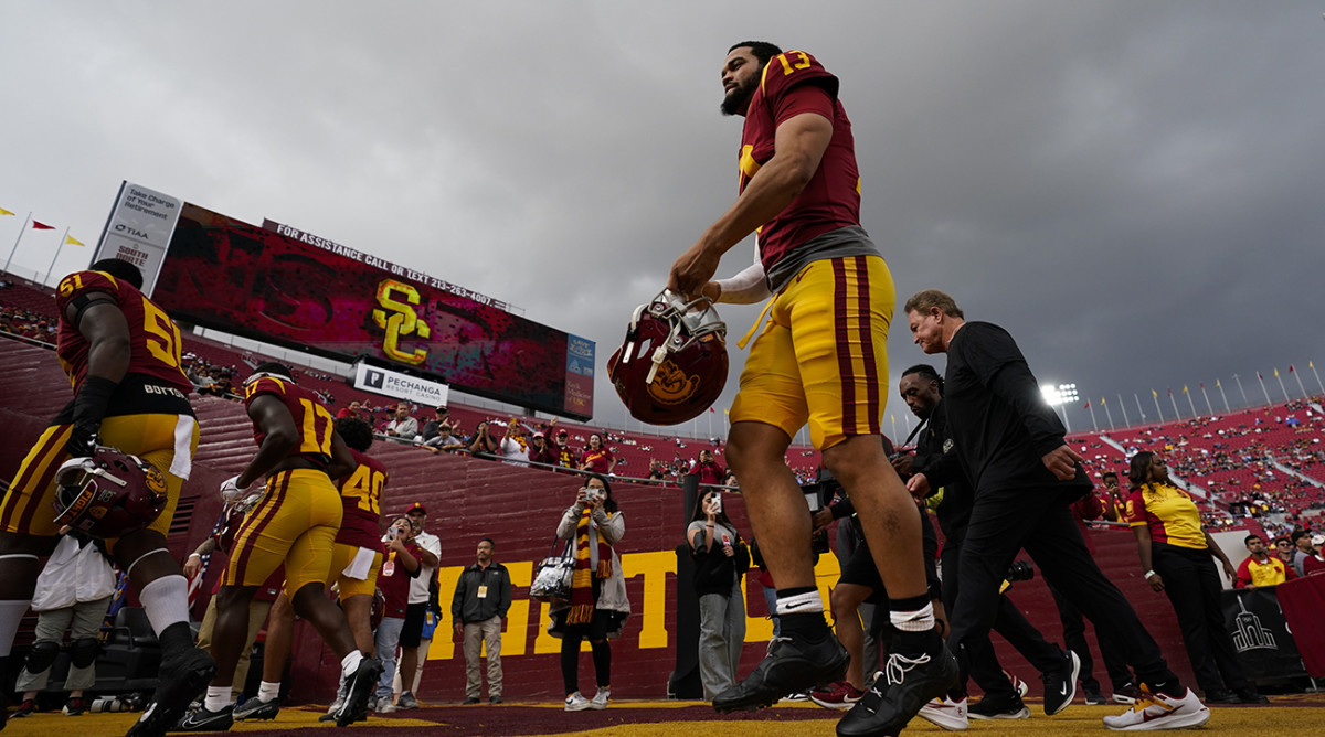 USC quarterback Caleb Williams (13) makes his way off the field after warmup up before a game against UCLA.